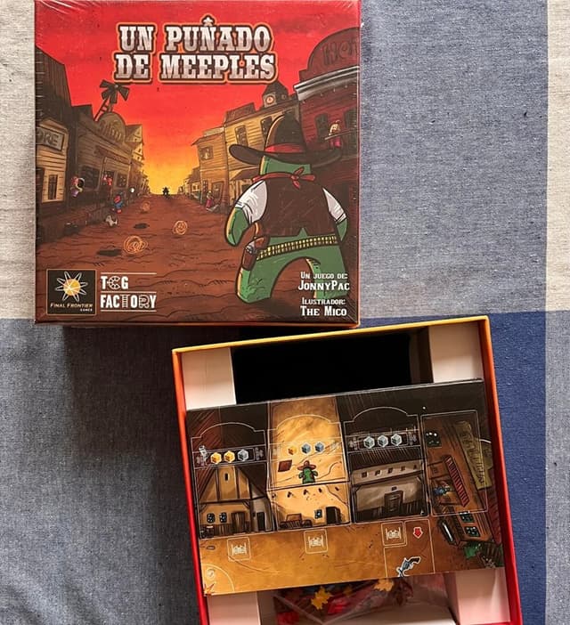Portada de Un Puñado de Meeples (abierto)